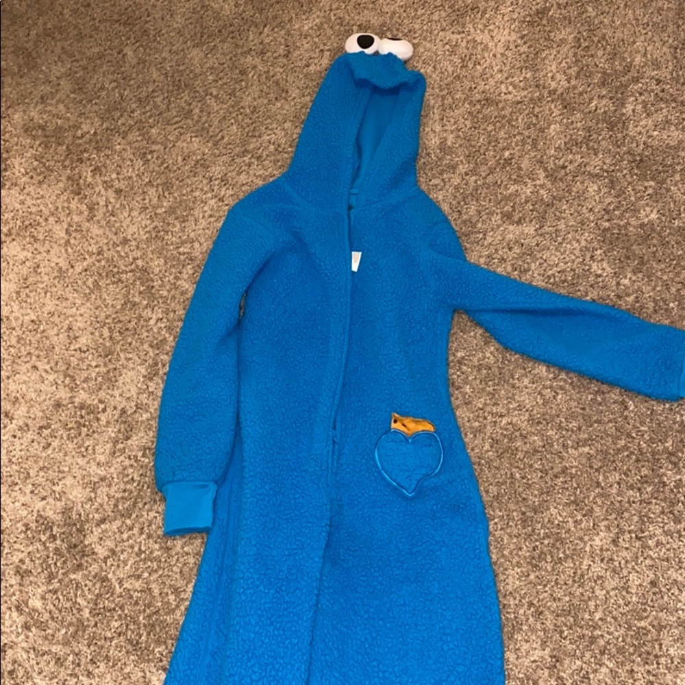 Super cute bright blue cookie monster onsie.